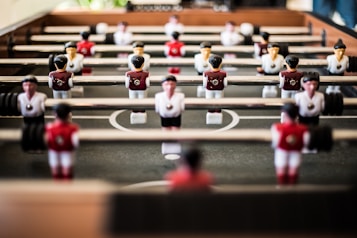 brown foosball table closeup photography