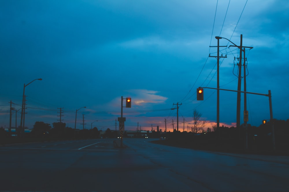 low light photography of concrete road