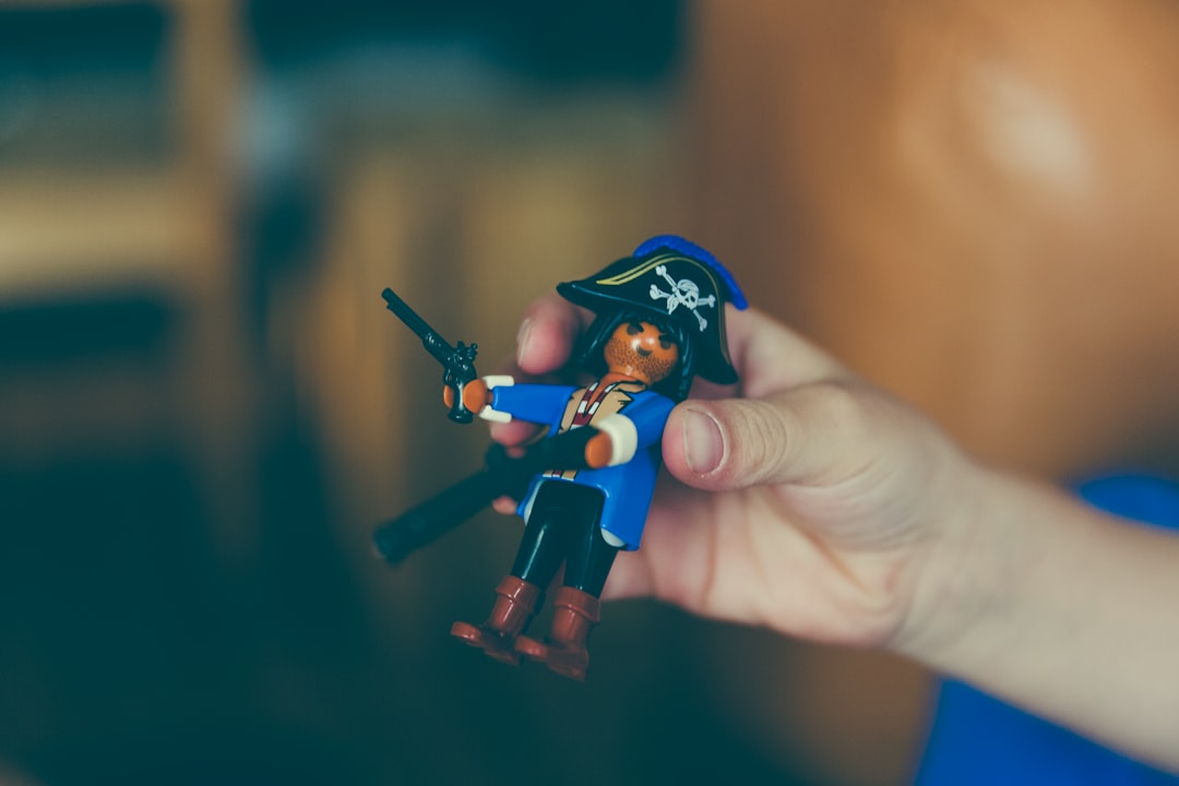 person holding Pirate figure