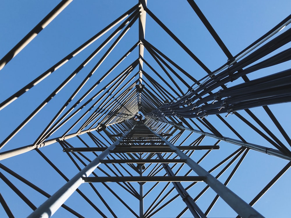 high angle photography of transmission tower