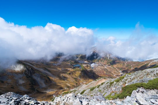 brown rock mountain during daytime in Mount Tate Japan