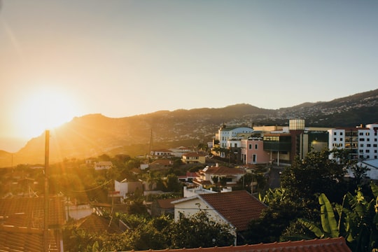 sun shining over city in Madeira Portugal