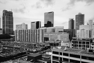 City skyline with various residential and commercial buildings.