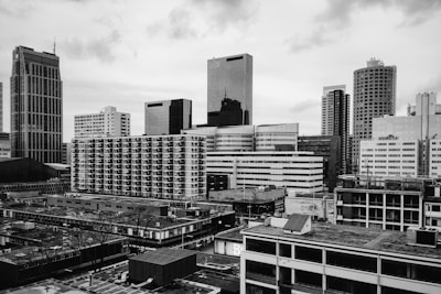 City skyline with various residential and commercial buildings.