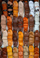 Soft natural leather textures and rich colors in a stylish sandal design.