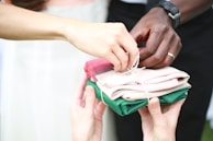 Hands demonstrating how to combine items from a derit bundle for best use.