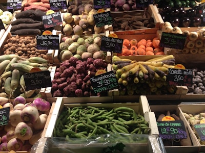 Colorful crates filled with fresh roots and tubers at a local market.