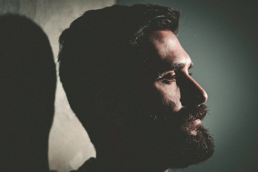 closeup photo of man with beard