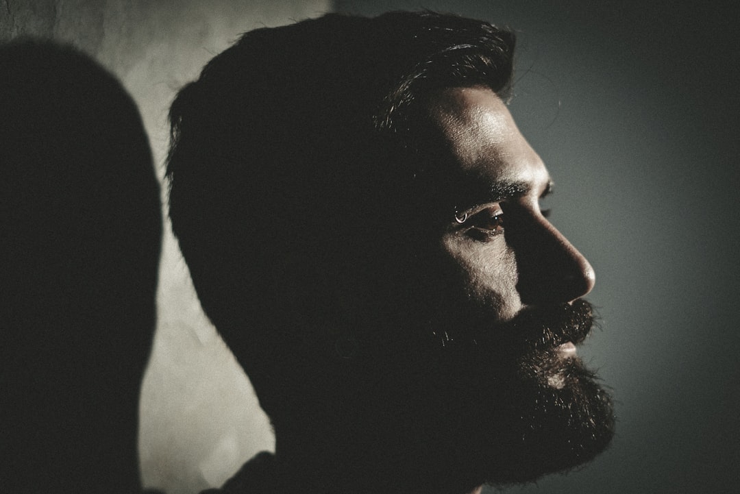 closeup photo of man with beard, Bearded man casts a shadow