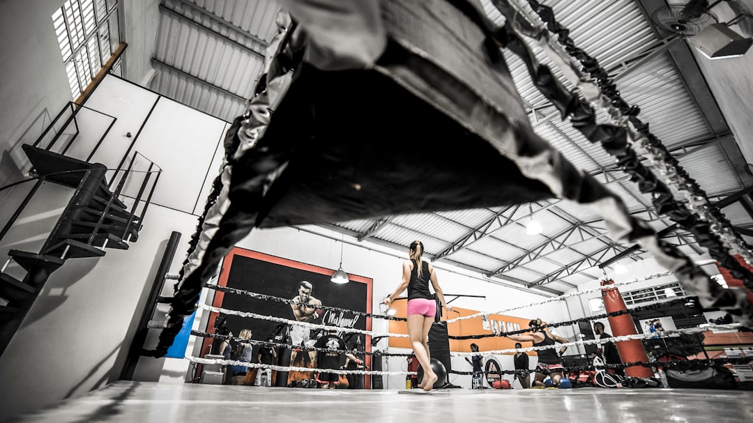  woman standing on boxing ring match box