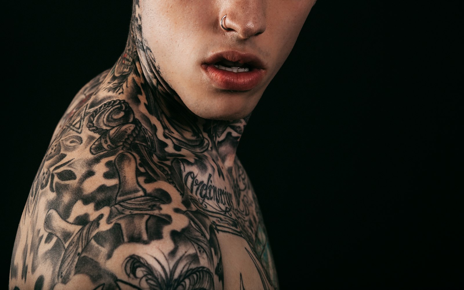 Canon EF 28-70mm f/2.8L USM sample photo. Person with skin tattoo photography