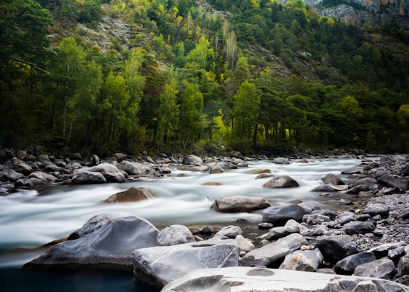 timelapse photograph of rocky river