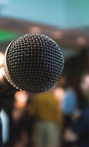 silver corded microphone in shallow focus photography