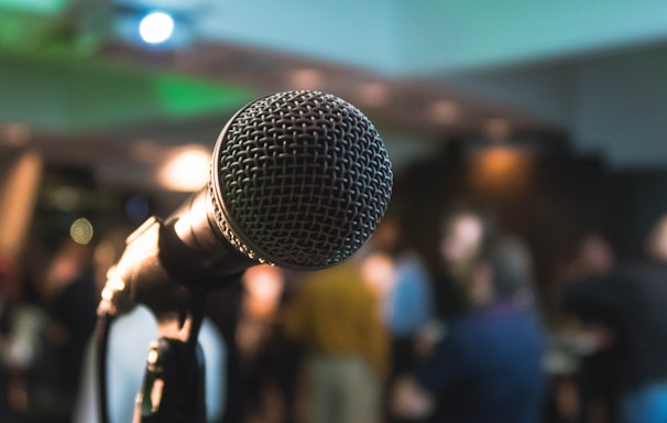 silver corded microphone in shallow focus photography