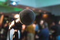 silver corded microphone in shallow focus photography