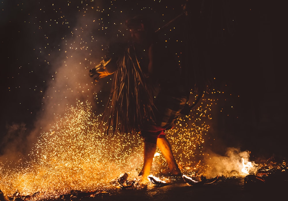 person walking of fire