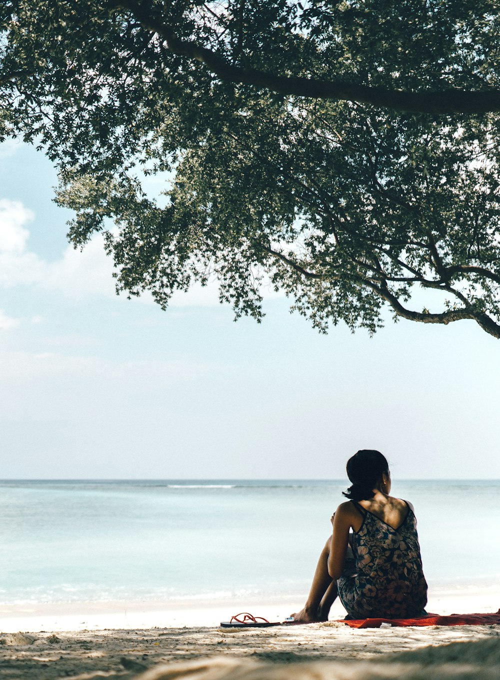 woman beside tree