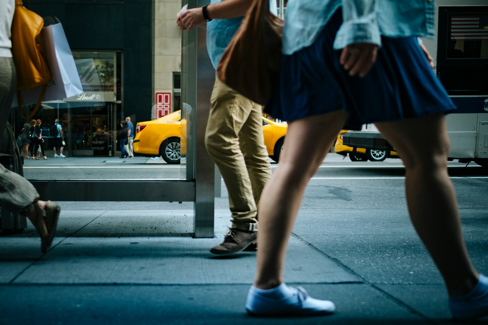 Fujifilm X-Pro1 + Fujifilm XF 23mm F1.4 R sample photo. Woman walking on road photography