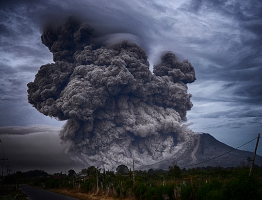 volcano eruption during daytime in Mount Sinabung Indonesia