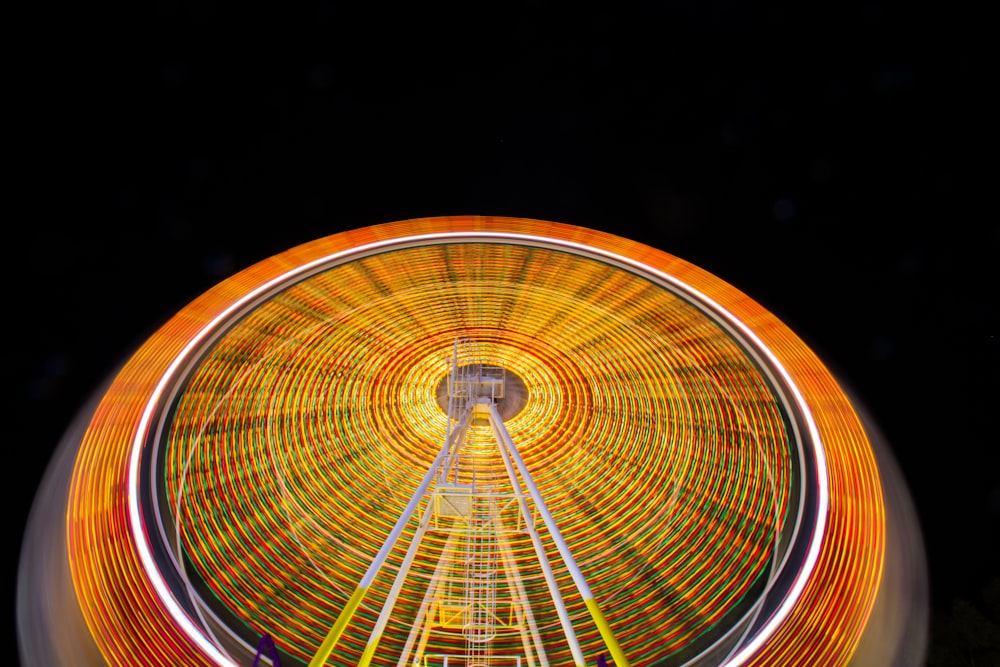 time lapse photography of ferris wheel