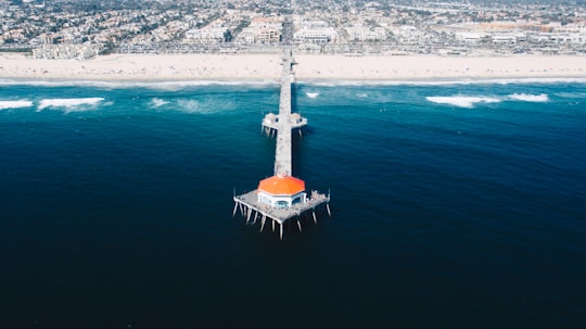 dome on a wooden dock in Huntington Beach United States