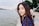 woman standing near body of water