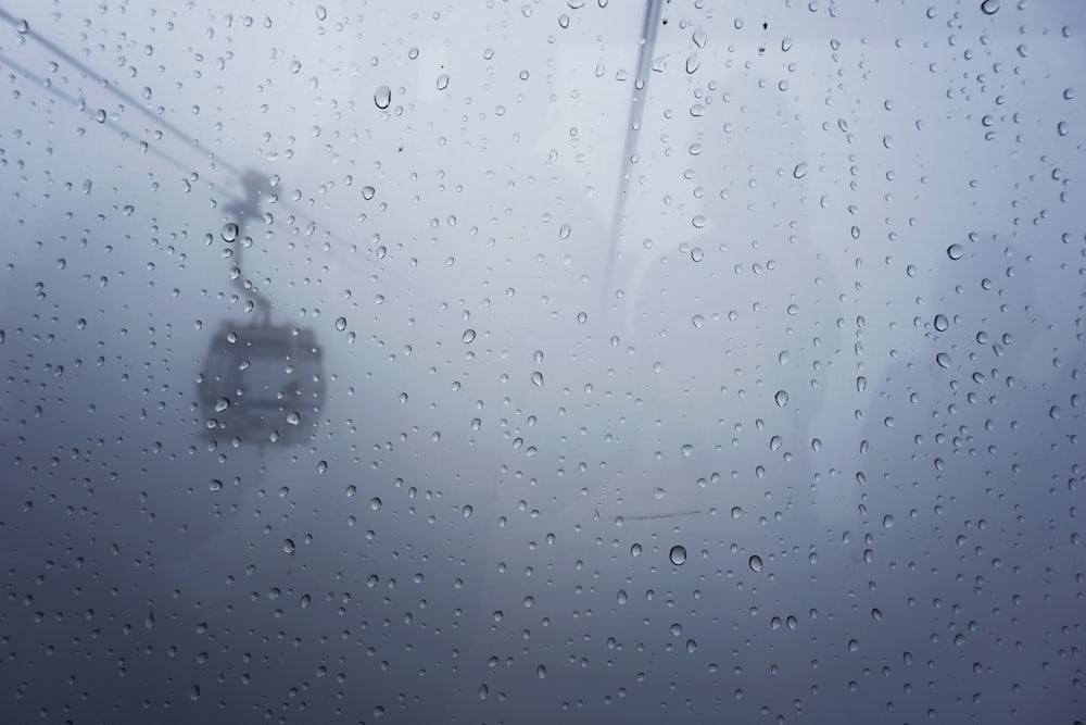 Heavy rain creating fog on a ski hill.