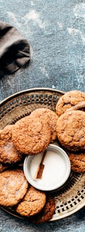 platter of cookies on top of blue surface