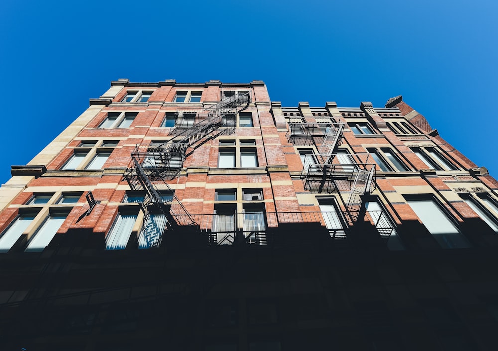 brown building under sunny sky