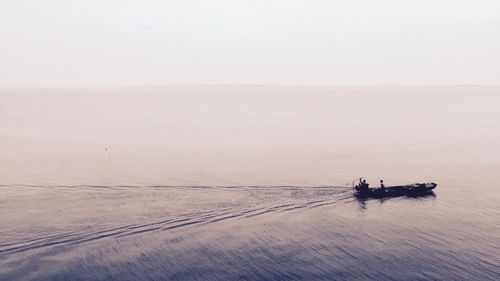 boat moving on body of water