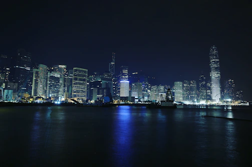 A vibrant city skyline at night with glowing lights