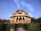 Dr. Gupta collaborating with Aga Khan Trust researchers at Humayun’s Tomb, Delhi, examining ancient manuscripts.