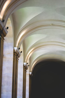 A serene architectural detail featuring soft stone textures and gentle shadows, evoking calm and timelessness.