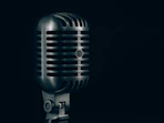 shallow focus photography of condenser microphone