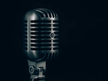 shallow focus photography of condenser microphone