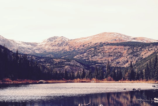 lake along mountain in Eldora United States