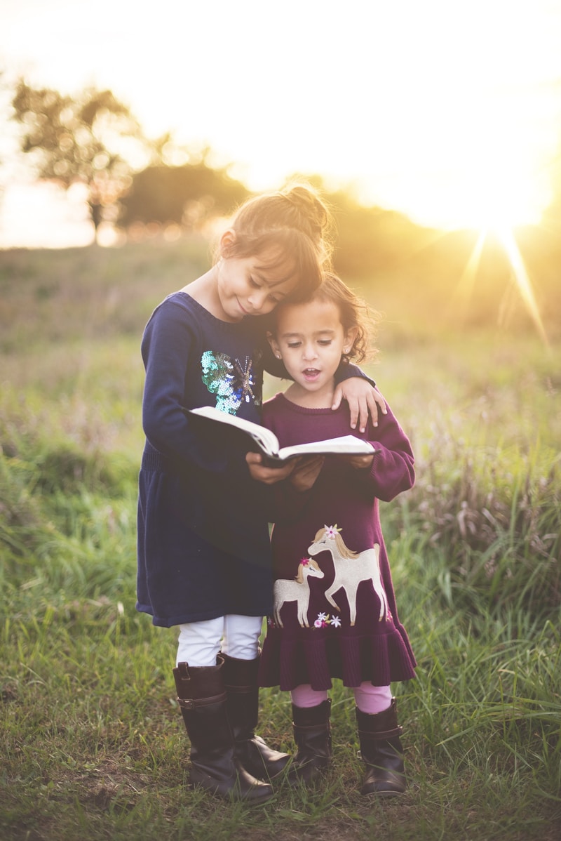 Warm, nurturing scene of parent and child having a gentle conversation together