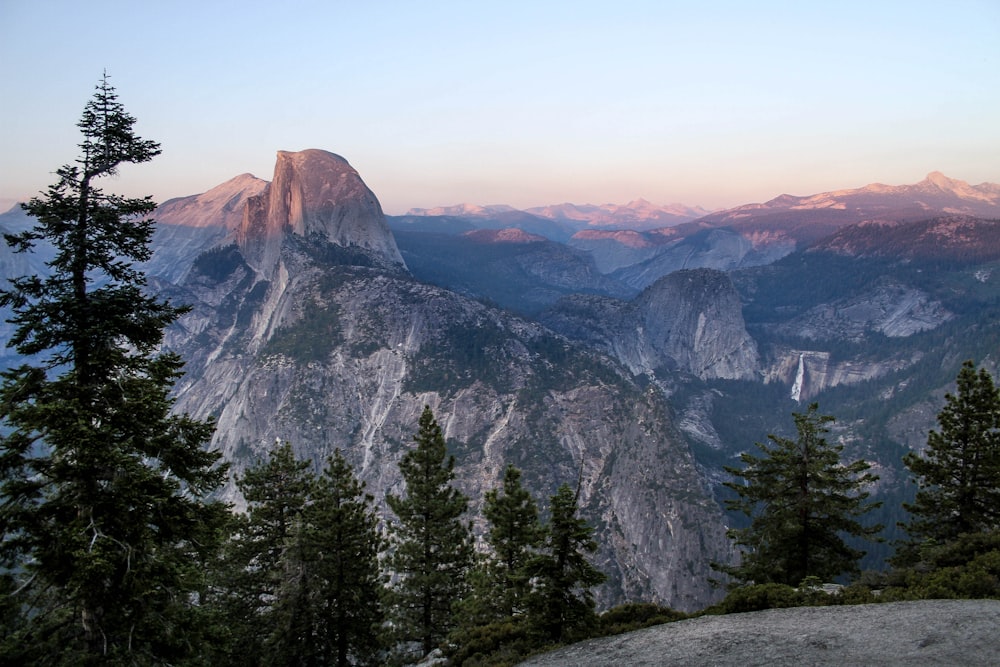 photo of mountain range under clear sky