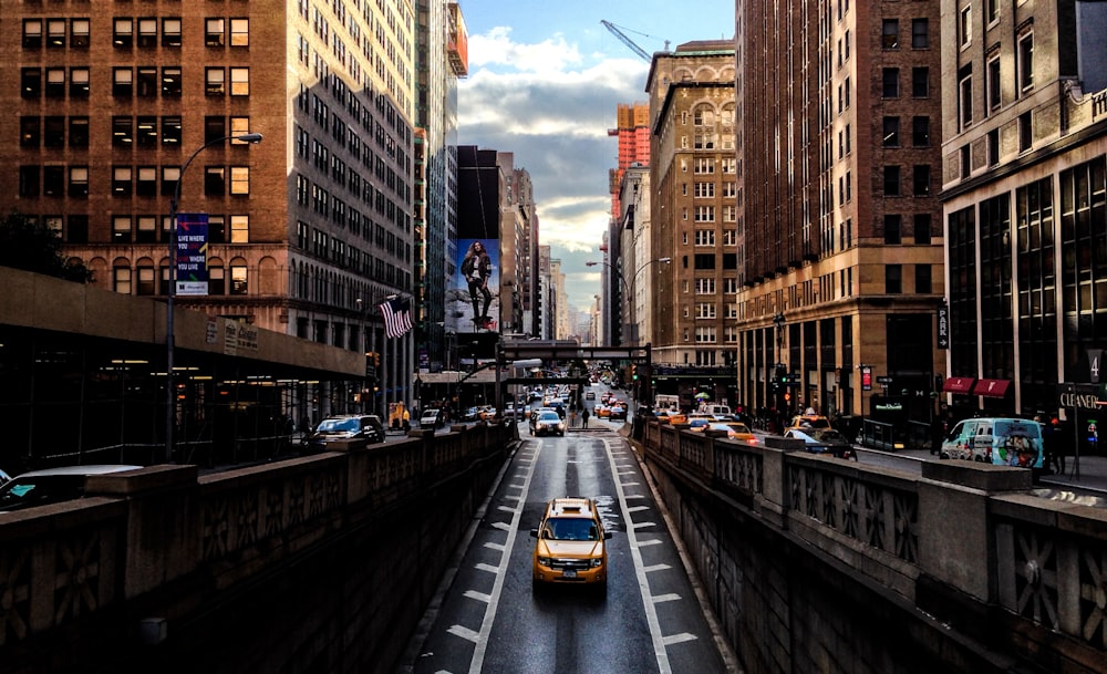 yellow vehicle on road