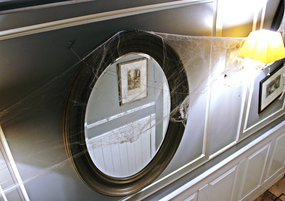 round black-framed mirror