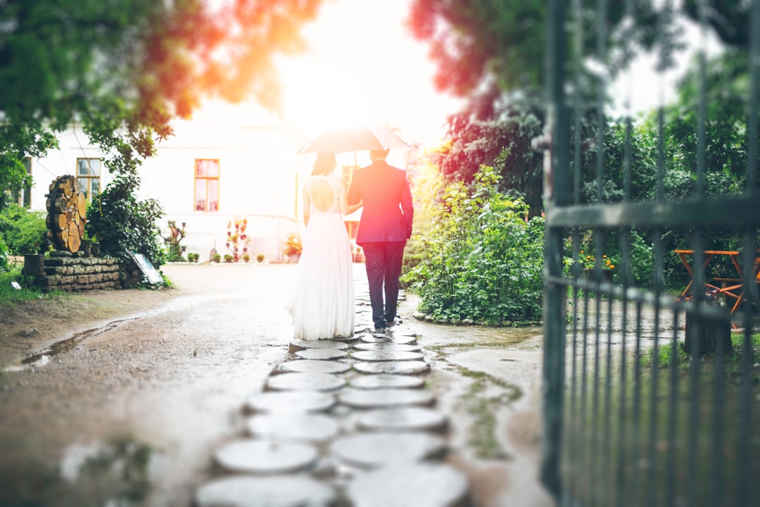 bride and groom walking on pathway