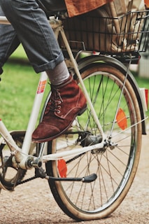 person wears brown suede dress shoe