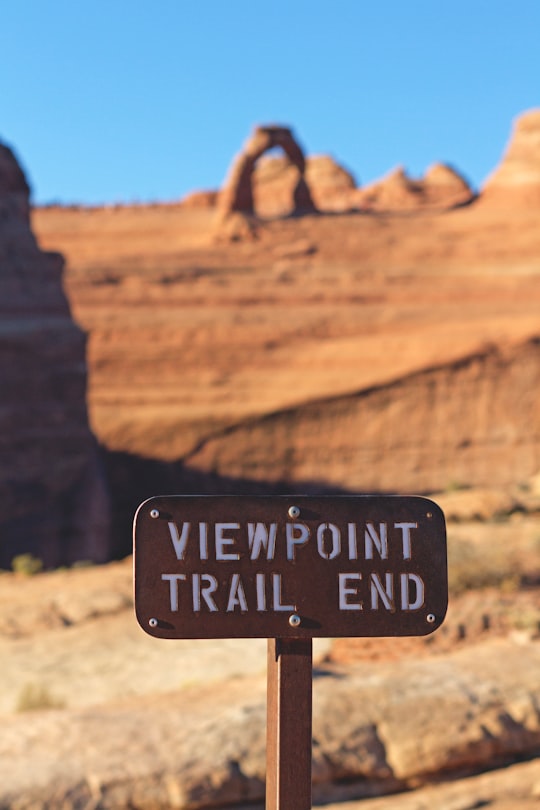 shallow focus photography of brown road signage in Moab United States