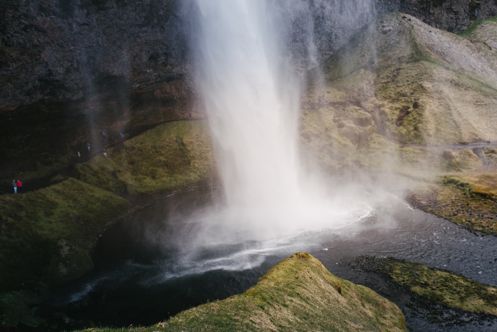 photo of waterfalls during daytime