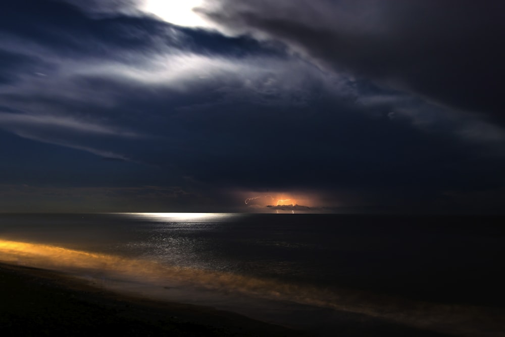 body of water at nighttime