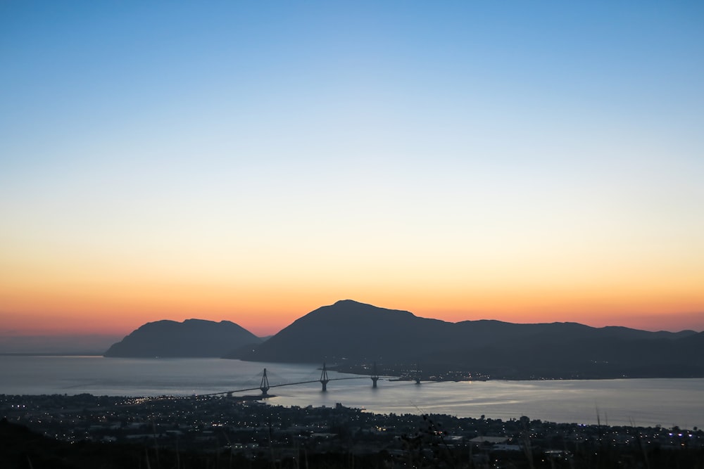 aerial photo of concrete bridge during golden hour