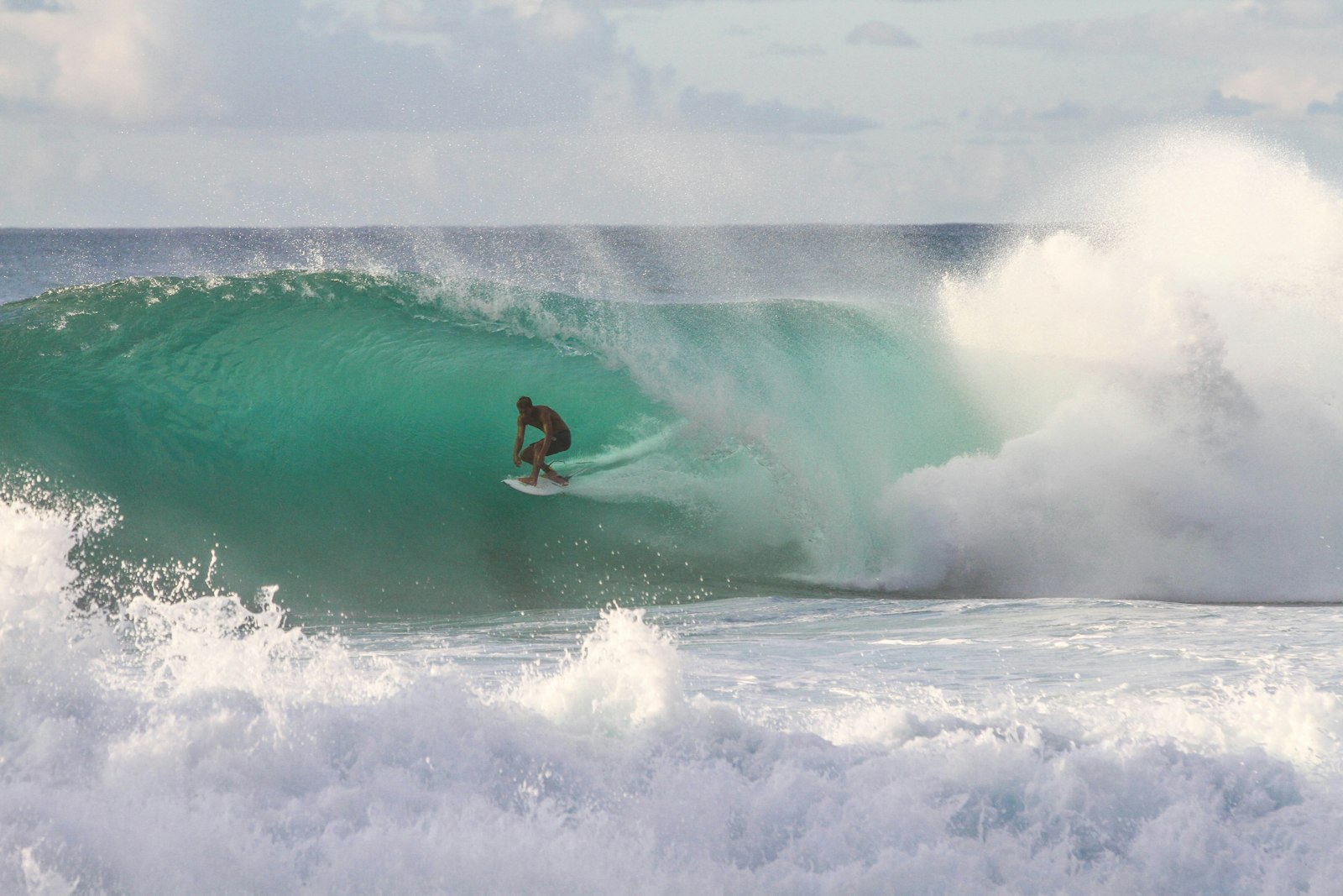 Canon EOS 7D + Canon EF 70-200mm F2.8L IS II USM sample photo. Man riding surfboard under photography