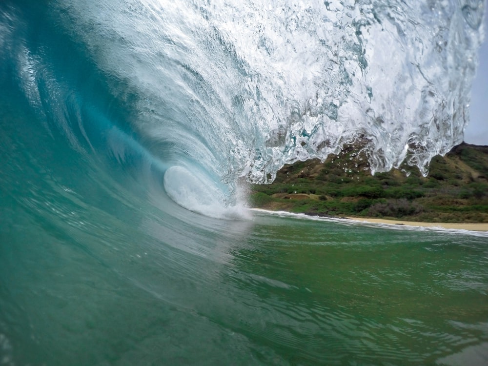 A macro shot of an incoming wave.