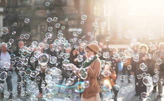 woman standing outdoor surrounded by bobbles during daytime