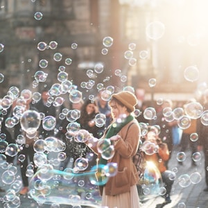 woman standing outdoor surrounded by bobbles during daytime